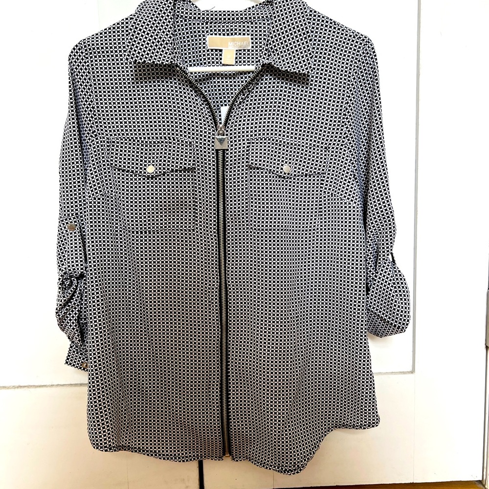 Long sleeved Michel Kors blouse.